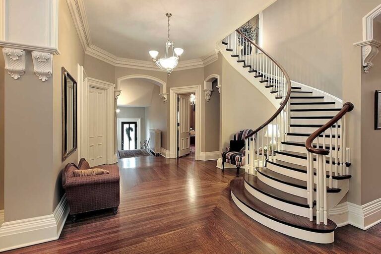 A homeowner reviewing home staging and repair checklists before meeting with prospective buyers.